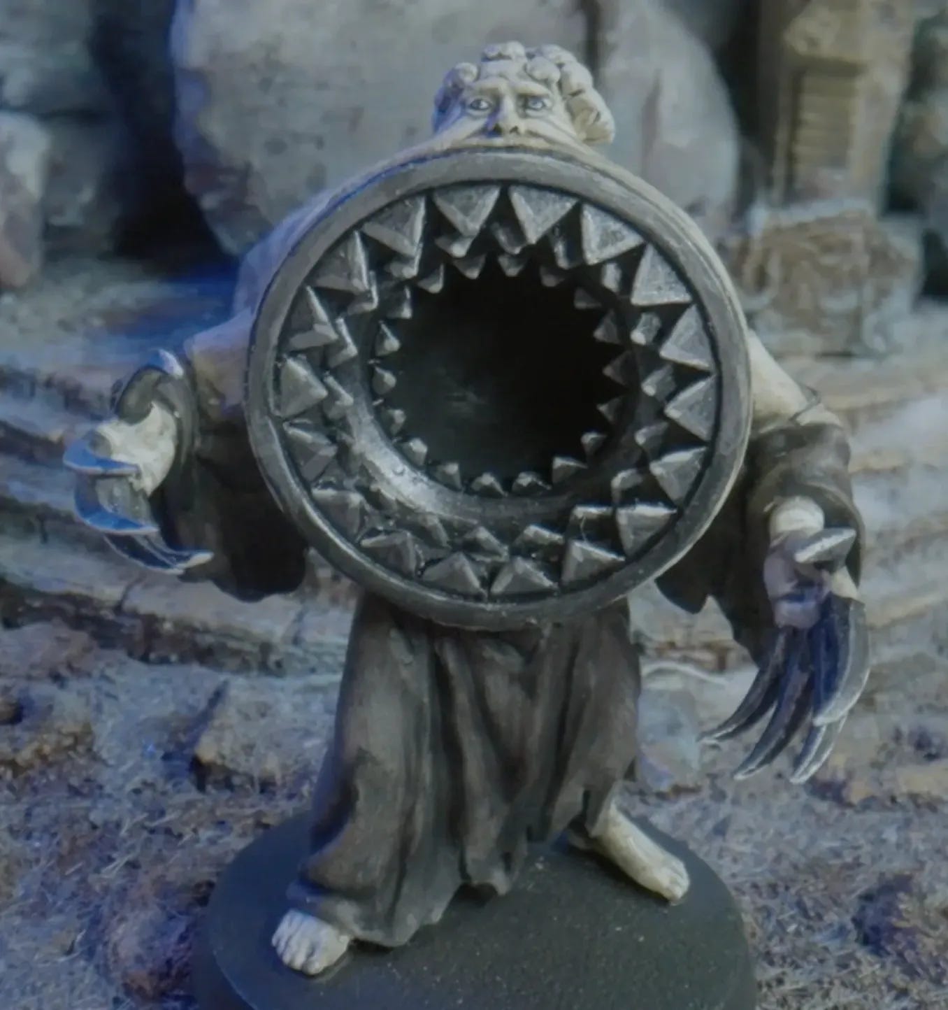 a particularly terrifying mini with rows of teeth instead of a torso.