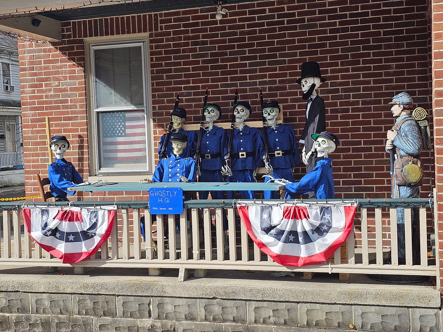 Table full of skeletons dressed in blue from the Civil War.