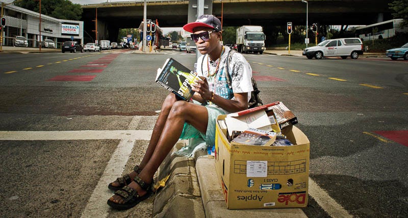 This homeless man uses books as weapons to fight poverty