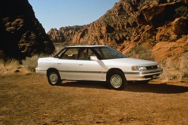 Subaru Legacy Production: 1990-Present Powered by a 2.2-liter BOXER engine with 130 hp. and 137 lb-ft. of torque   First model to relocate the spare tire from the engine compartment to the trunk   Available in standard, L or LS trim levels in either sedan or wagon   5-speed manual and "Hill Holder" was standard   Four-wheel disc brakes and multi-point fuel injection were also standard equipment
