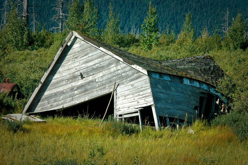 Remains of a cabin from the ghost town of Portage, Alaska.