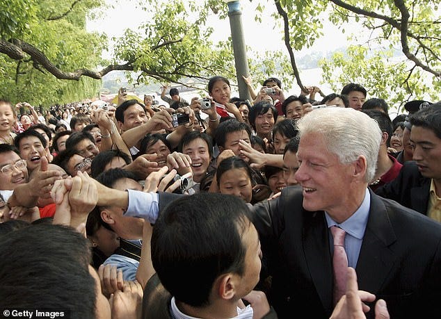 Few details about Epstein's role in Clinton's trip to China have been revealed before but were hinted at by reports. The New York Times, reporting on Clinton's stop in Taiwan , said that he arrived from Japan by 'private plane' but gave no further details. Clinton is pictured in China in 2005