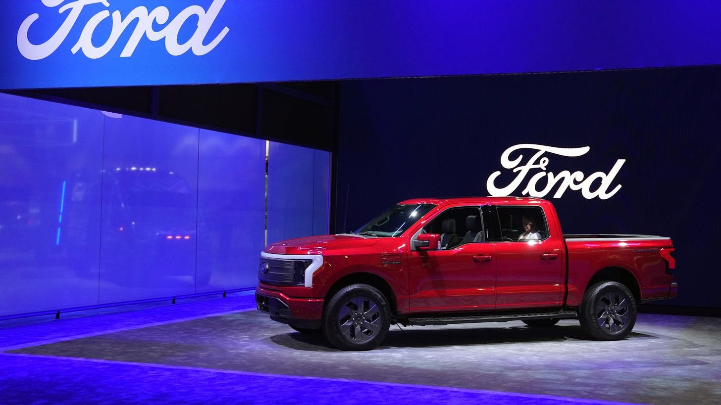 Ford unveils the new F-150 Lightning electric pickup during a Los Angeles auto show in November.