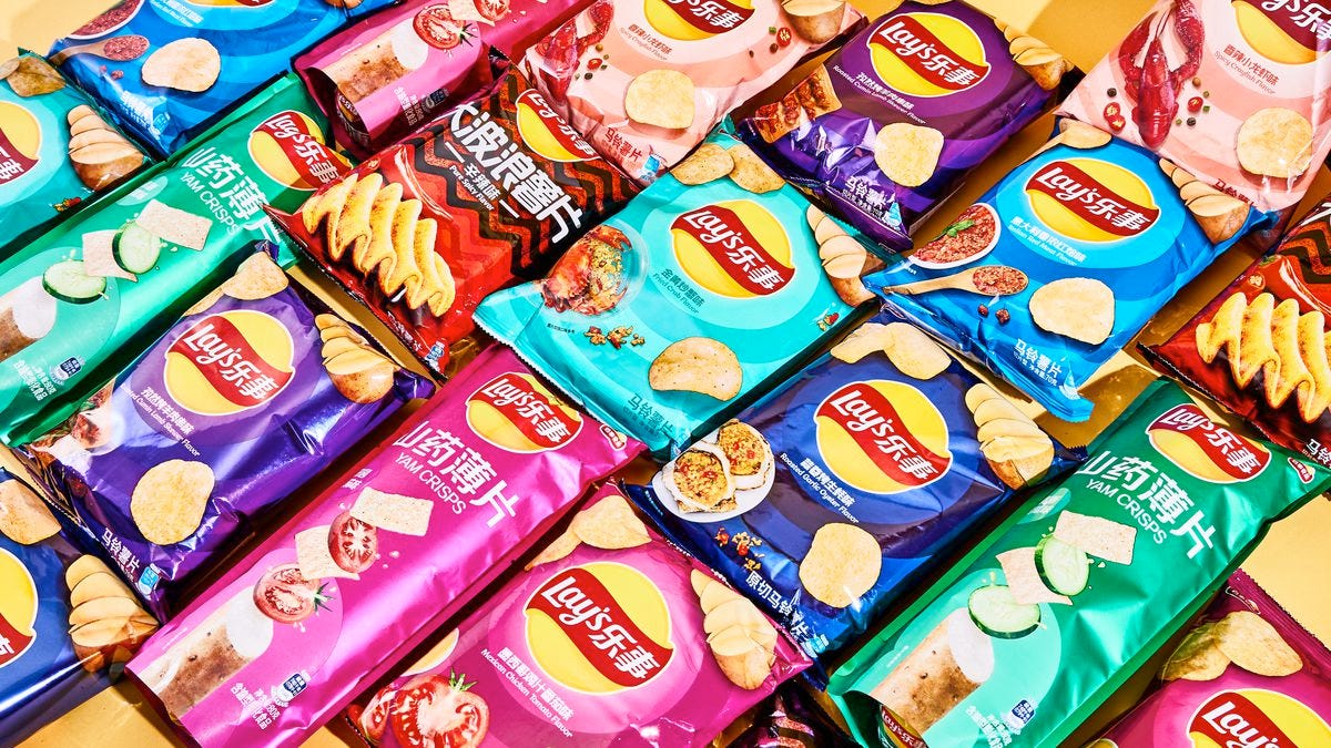 A big, colorful array of packaged Lay’s chips.