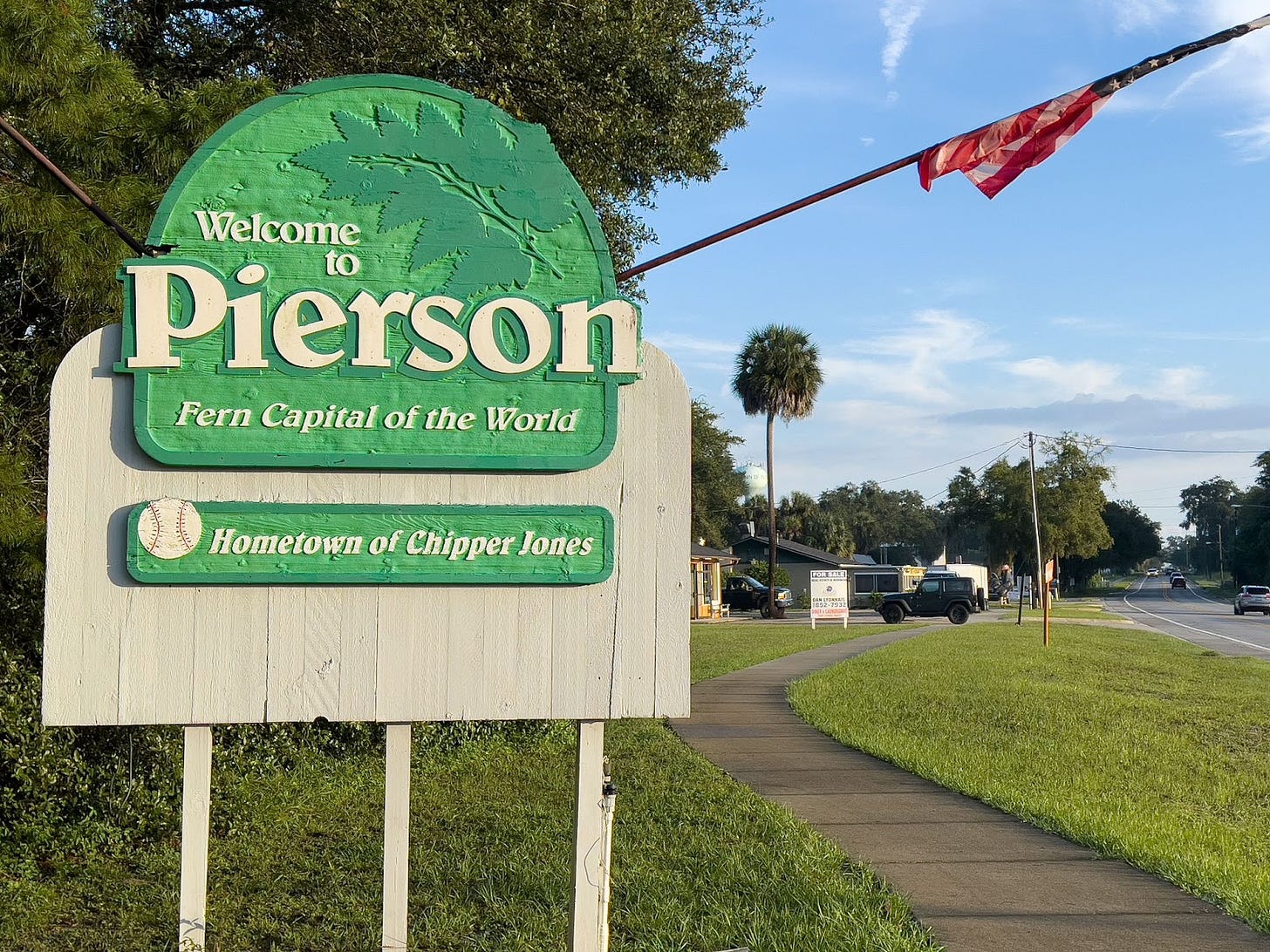 A welcome sign in Pierson, Florida, describes the community as the “fern capital of the world.” (Photo by Jennifer Taylor)