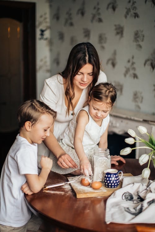 Free Woman Playing With Her Children Stock Photo