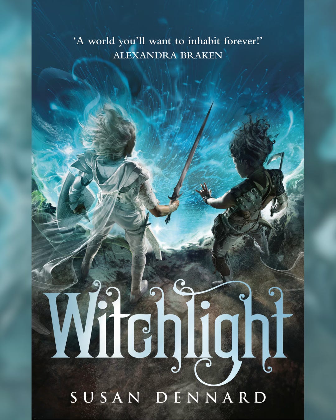 The book cover for Witchlight shows Safi in white on the left and Iseult in black on the right. The title reads Witchlight, with my name, Susan Dennard, also on the cover