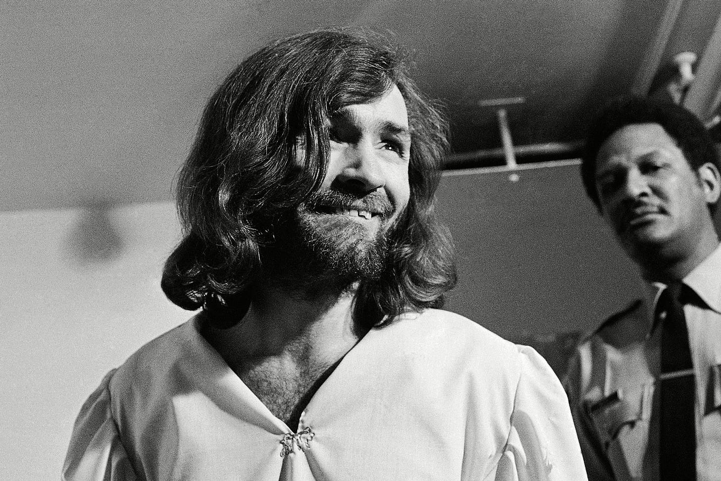 Charles Manson replies "It all depends on your point of view," after a newsman asked him "Are you insane, Charlie?", in Los Angeles. The exchange came as Manson left court where he won permission to hire a new attorney, replacing one who had sought to have Manson examined by psychiatristsCharles Manson Trial 1970, Los Angeles, USA