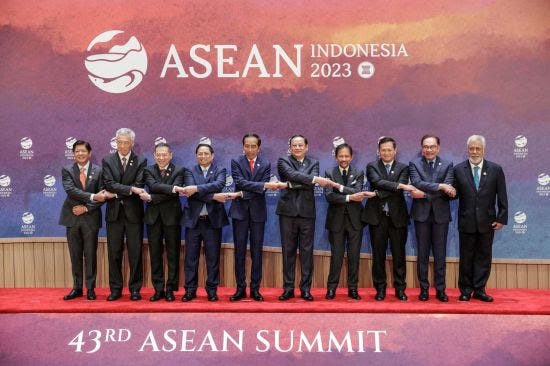 Top ASEAN officials pose for a photo at the summit in Indonesia.