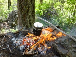 Survival rule of threes. A pot over a fire.