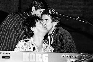 Face to Face: Ian McLagan (center) and Ronnie Lane (right) with Bucks Burnett onstage at Fitzgerald's in Houston, Feb. 28, 1985