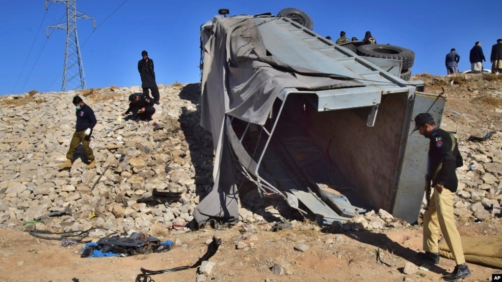 FILE - Pakistani security officials inspect a damaged truck at the site of suicide bombing on the outskirts of Quetta, Pakistan, Nov. 30, 2022. The Tehrik-i-Taliban Pakistan, also known as the Pakistani Taliban, claimed responsibility for the attack