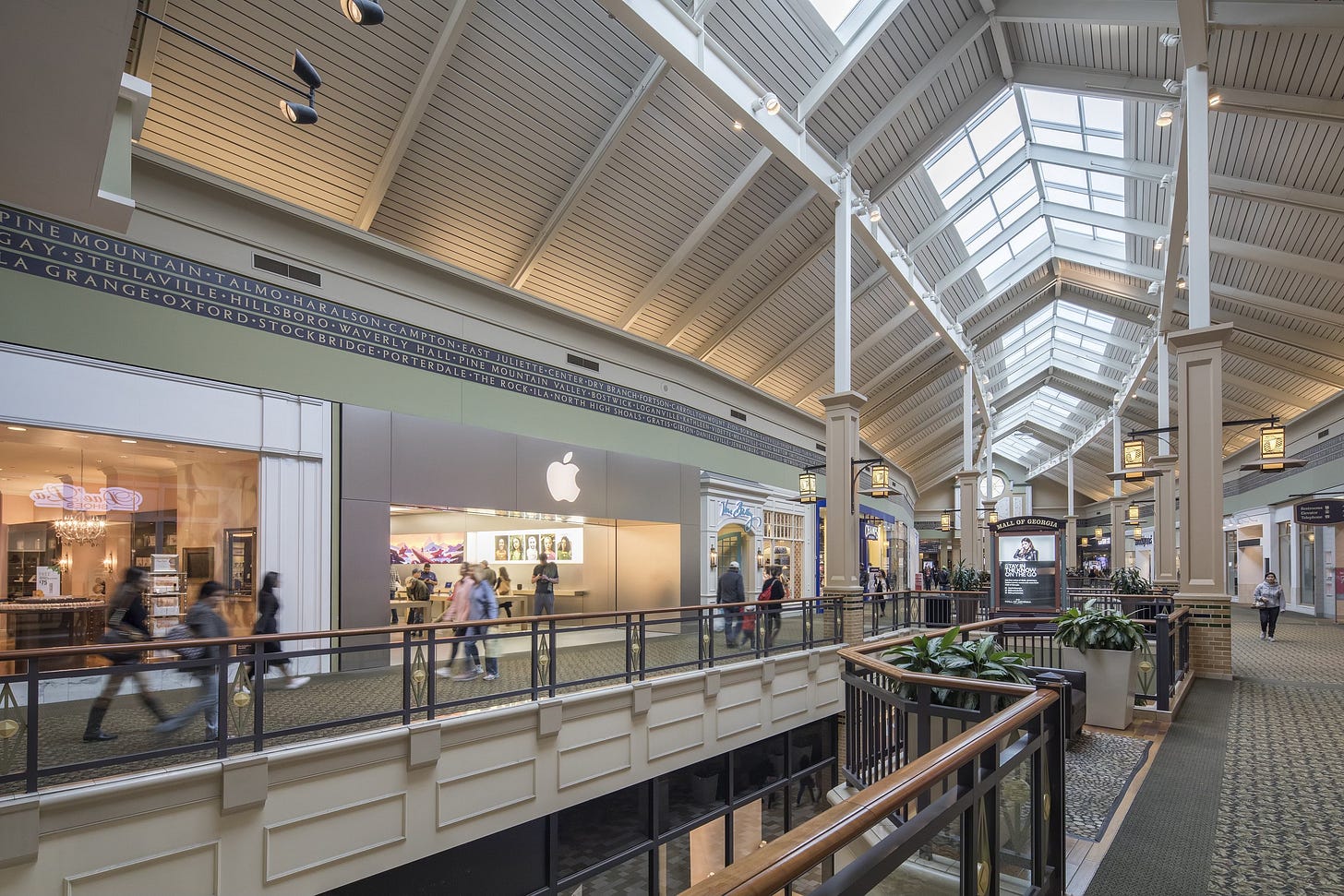 The upper level of Mall of Georgia. Apple's current location is along the lefthand coridoor.