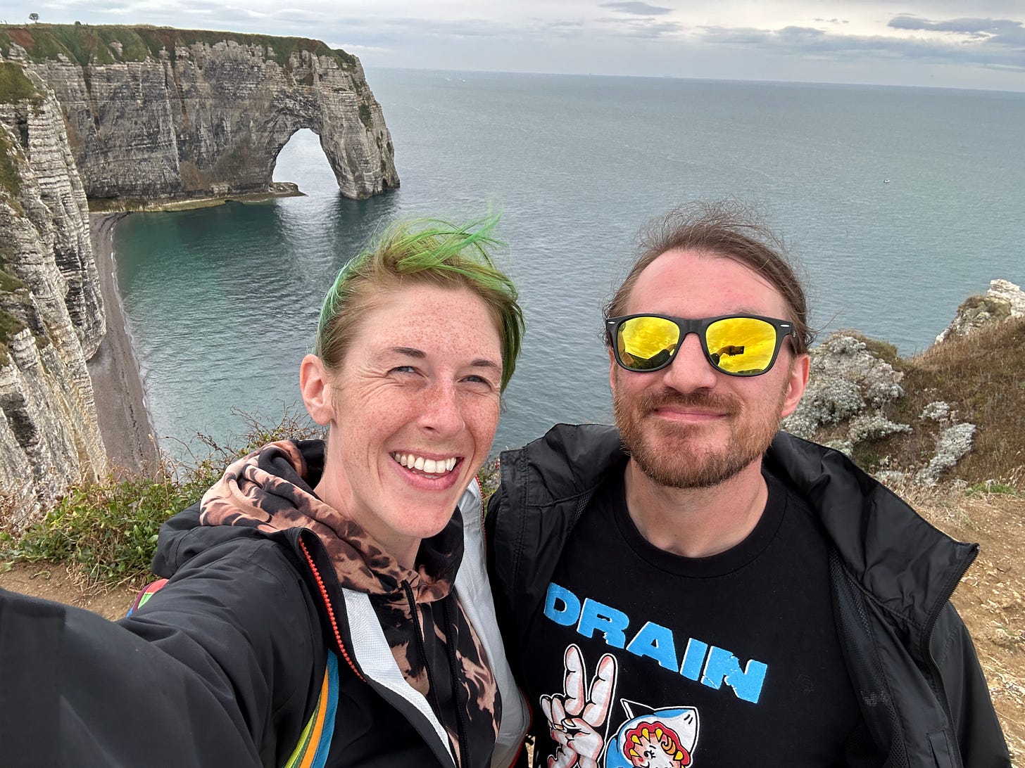 Jamie and Cory stand with the English channel at their backs