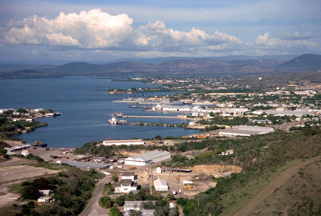 High oblique view of Naval Station Guantanamo Bay, Cuba looking northeast.  Corinaso Point is on the