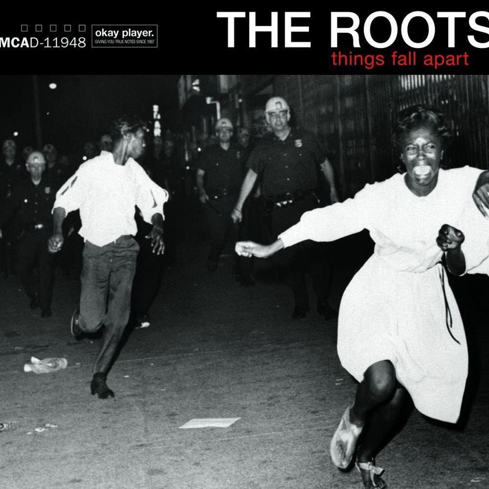 Album cover "Things Fall Apart" by The Roots, showing an image of a screaming Black woman running away in terror from White Police in Civil Rights era America.