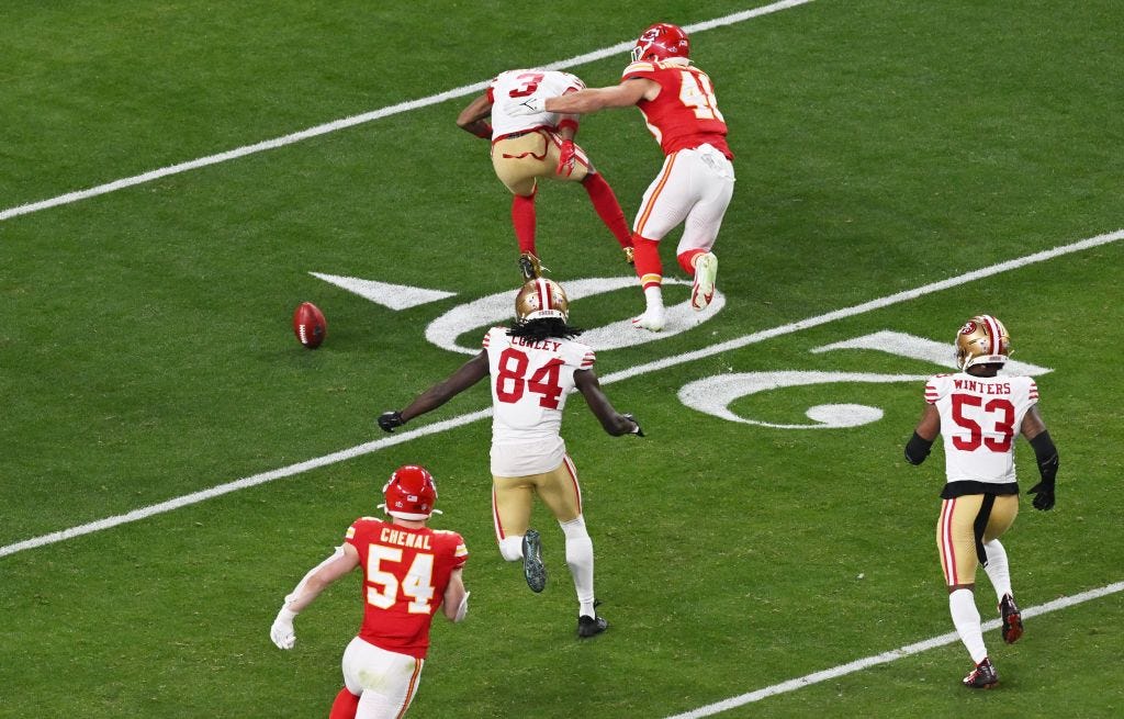 The ball rolls free after San Francisco 49ers cornerback Darrell Luter Jr. muffed the catch of a punt from the Kansas City Chiefs in the third quarter.