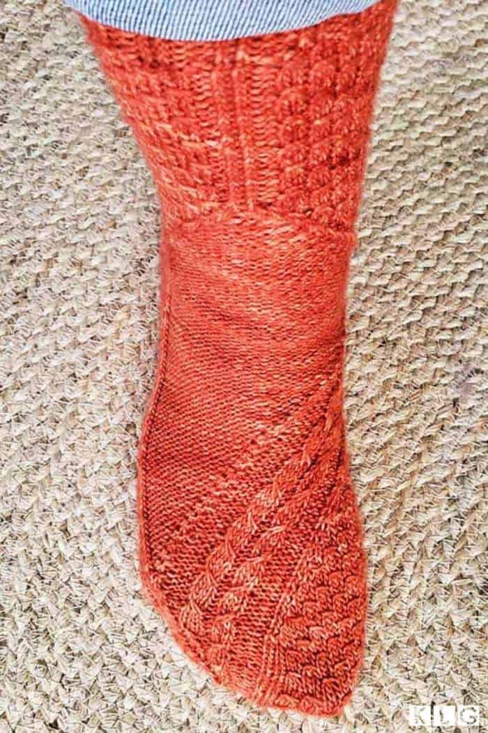 One of my Smaug socks completed. The cable design representing the dragon's tail looks fabulous.