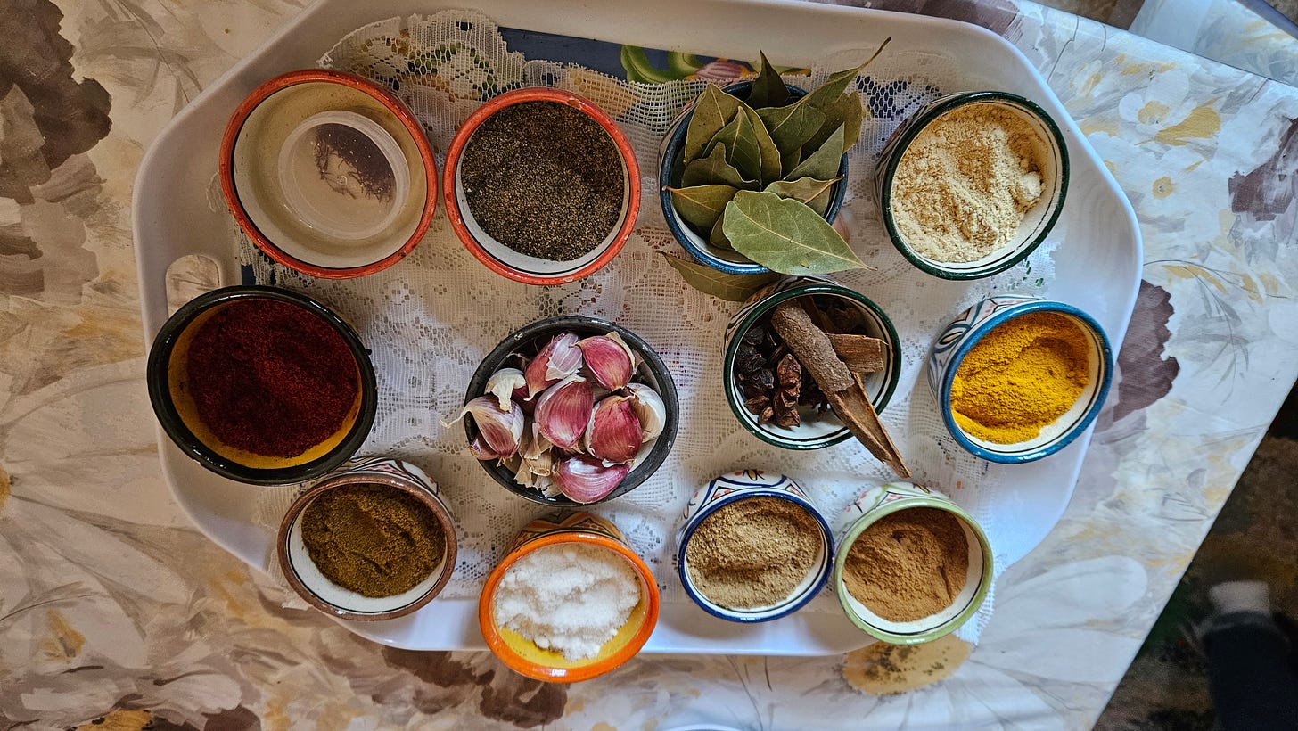 A display of spices and aromatics used in the meal