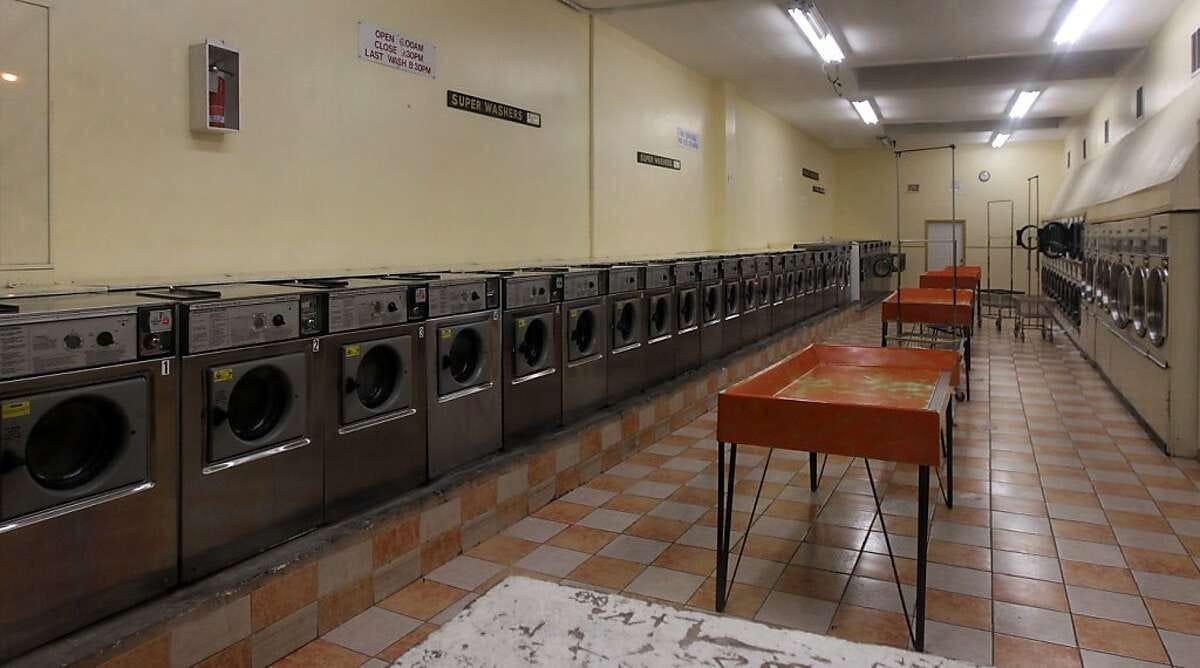 A man passes the Laundromat on Silver Ave in San Francisco that was the scene of a Zebra gang murder of Jany Holly on Jan. 28, 1974 as she loaded clothes into a dryer, she was shot in the back. photo taken Saturday August 21, 2012. In San Francisco California.