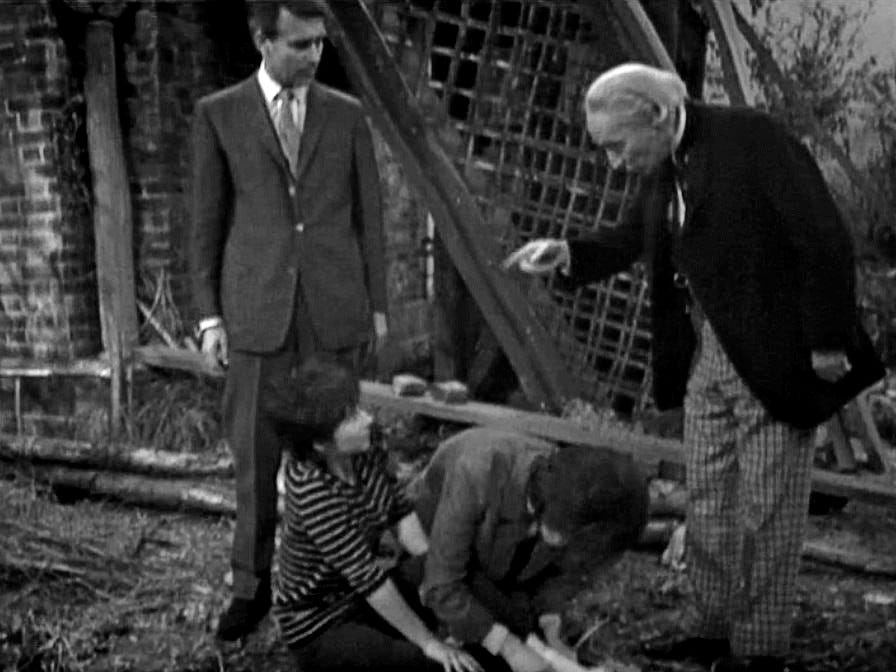 Screengrab of the Doctor telling Susan "What you need is a jolly good smacked bottom!” in The Dalek Invasion of Earth