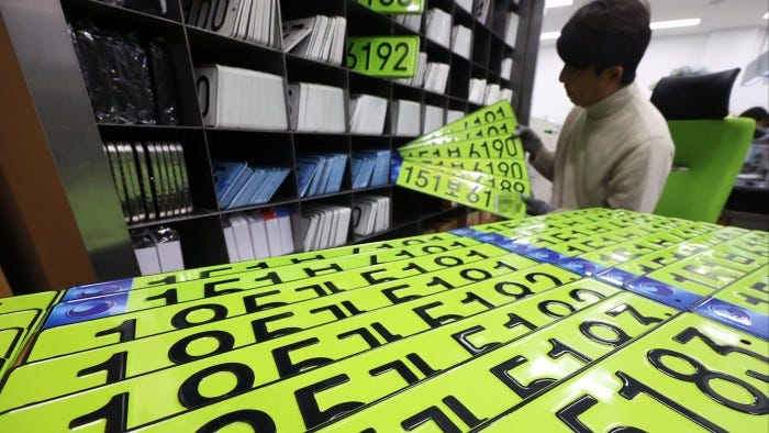 Luxury car sales plunge as buyers put off by South Korea's neon green licence  plates