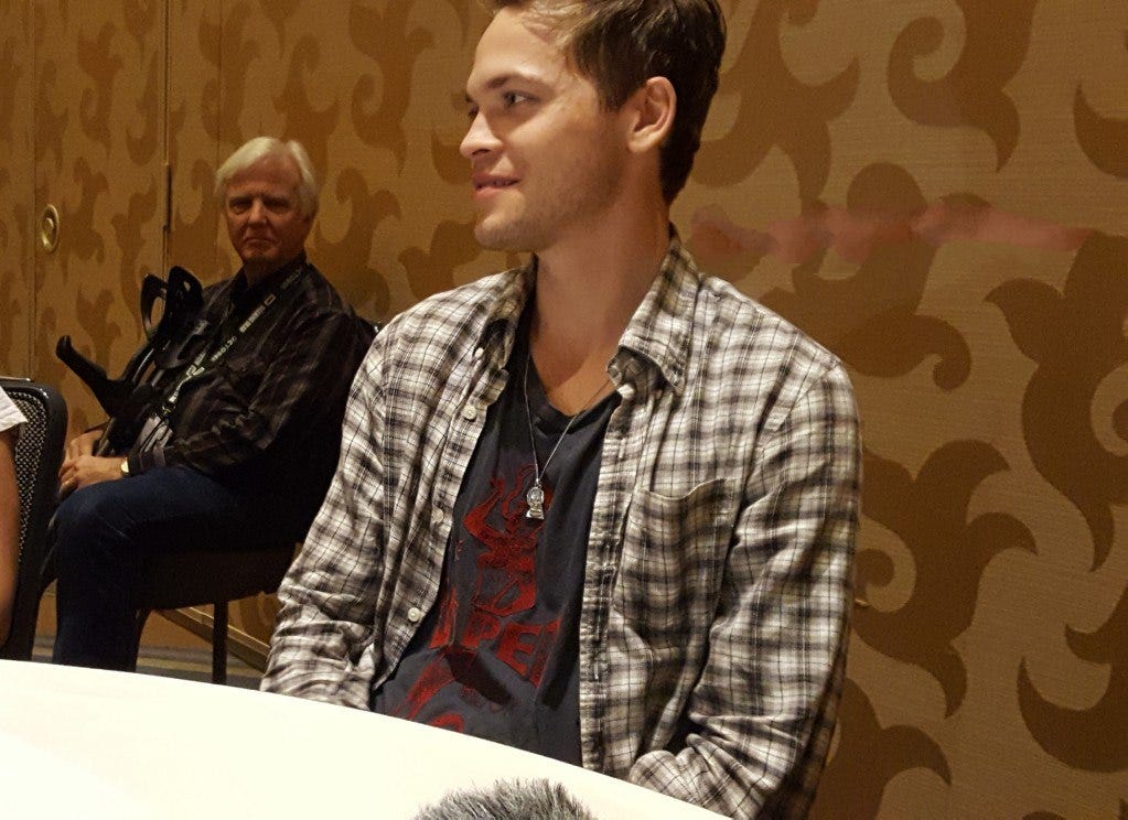 alex calvert smiling for mttg at comic con interview