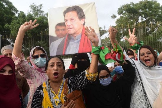 Pakistan Tehreek-e-Insaf party supporters protest against the arrest of former Prime Minister Imran Khan.