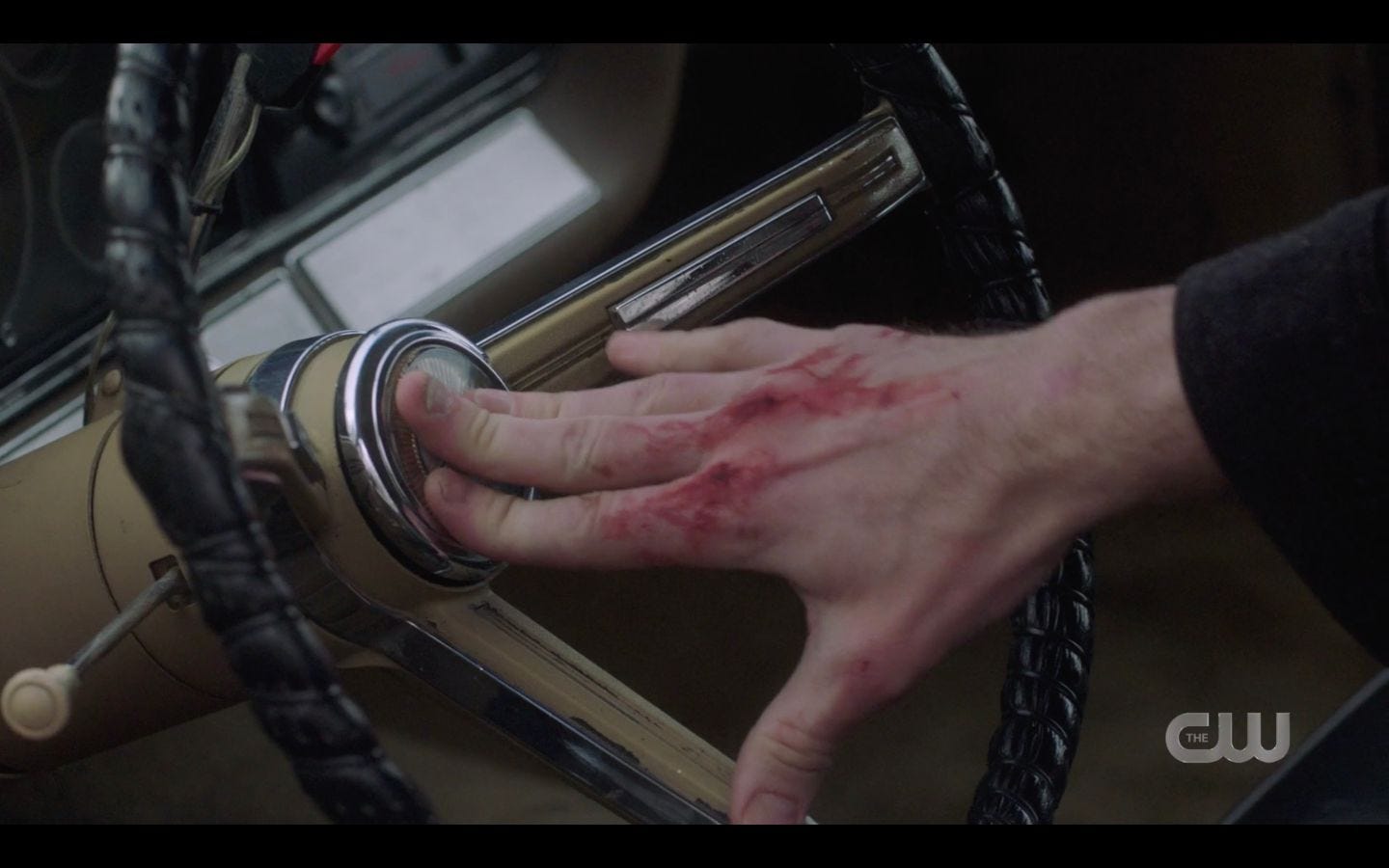 Sam Winchester bloody fingers pushing Baby horn for Dean SPN 14.17