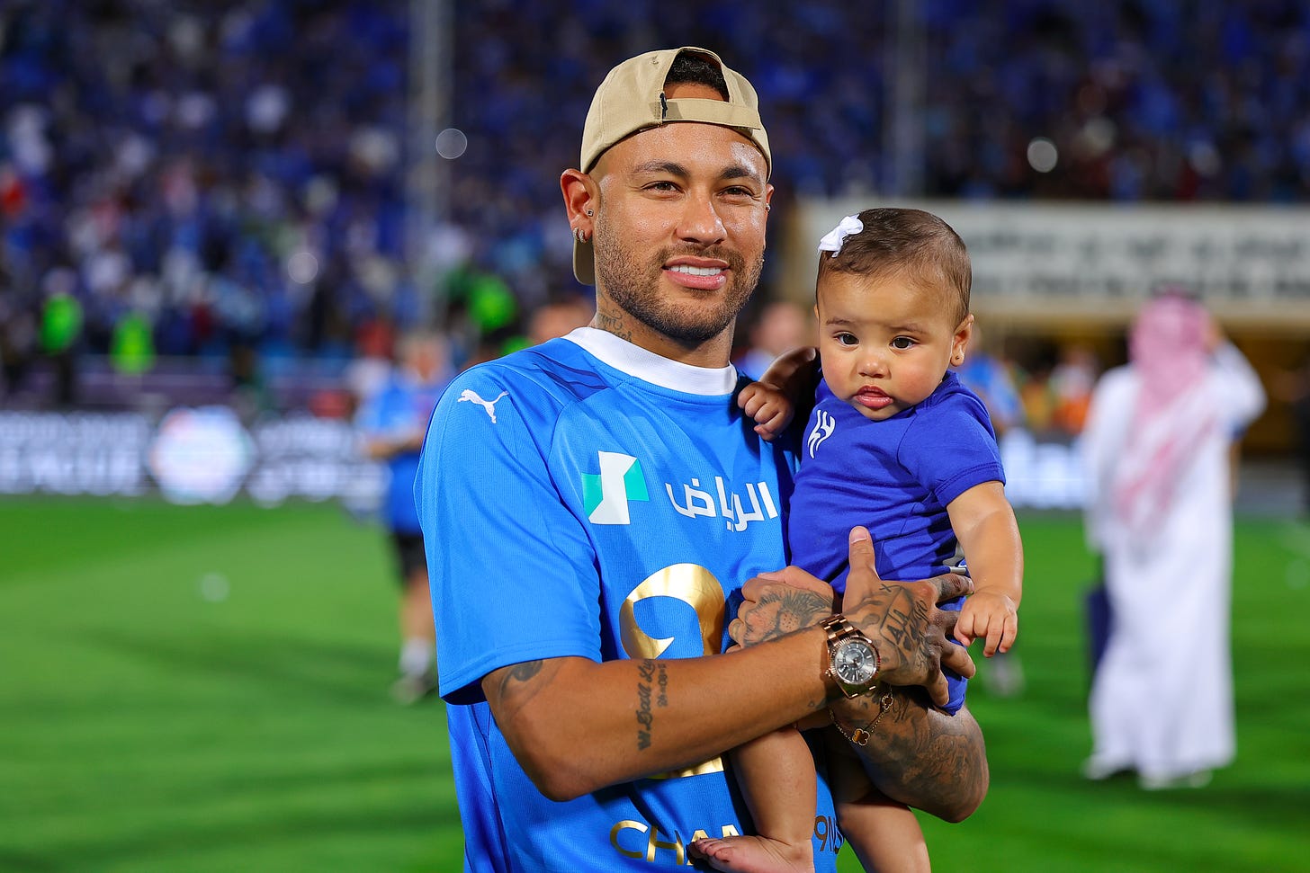 Neymar and baby daughter Mavie pictured wearing Al-Hilal jerseys following the club's Saudi Pro League title triumph in May 2024