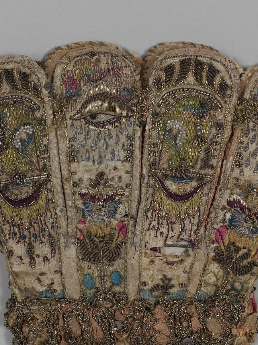 Pair of gloves, Leather, satin worked with silk and precious metal thread, seed pearls; satin, couching, and darning stitches; metal bobbin lace; paper, British 