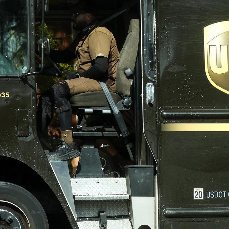 UPS driver in truck UPS driver in truck