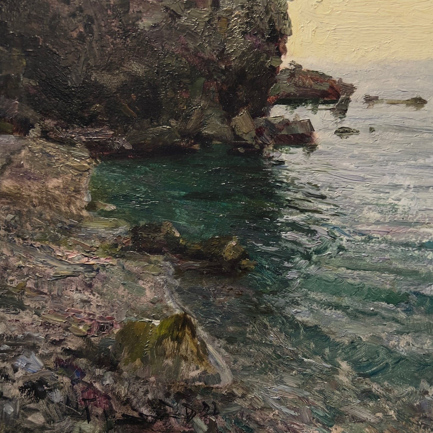 A painting of a rocky beach

Description automatically generated