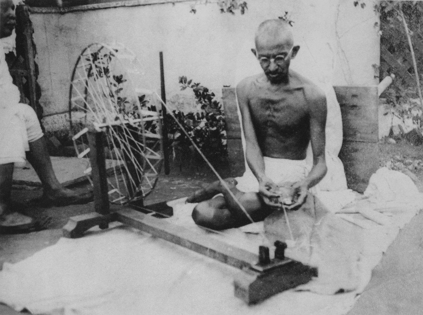 Gandhi at his spinning wheel