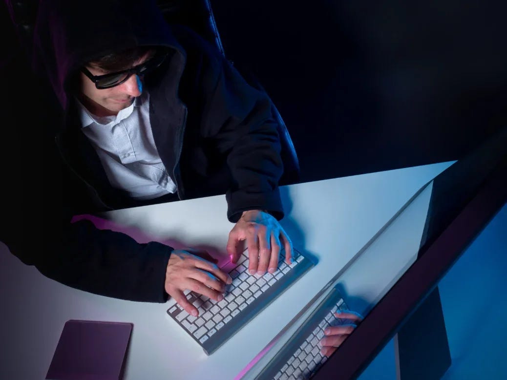 Mystery person at laptop. Picture: Shutterstock