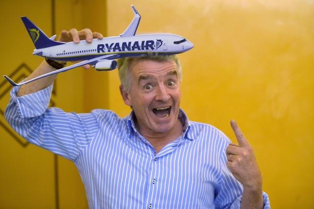 Climate activists greet Ryanair CEO with a pie in the face, but he rips  them for using artificial cream: 'I invite passengers to come to Ireland  where the cream is better!'