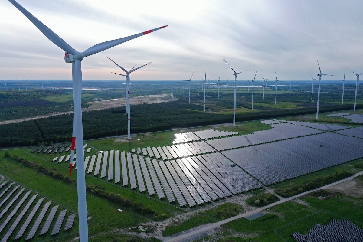 Aerial view of wind turbines and solar panel arrays at the Klettwitz Nord solar energy park near Klettwitz, Germany