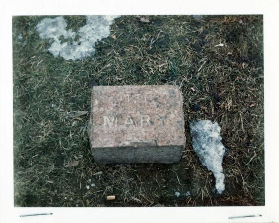 Image of a gravestone with the word Mary on it