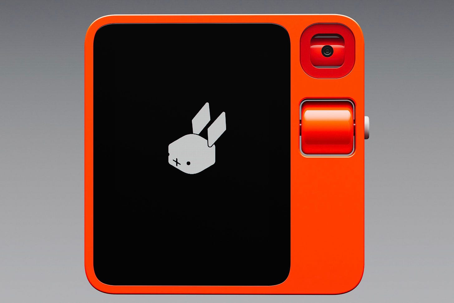 A photo of the red Rabbit R1 on a gray background.