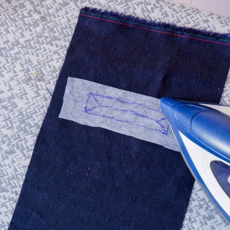 fusing the interfacing on the wrong side of the fabric