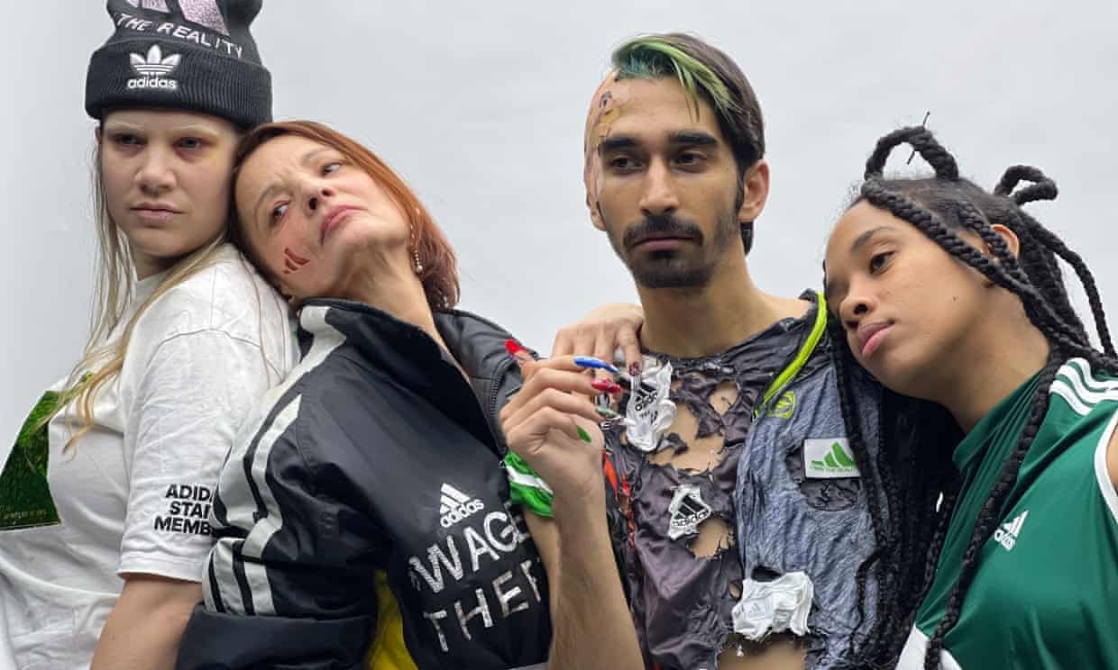 Activists posing as models during Adidas fake event.