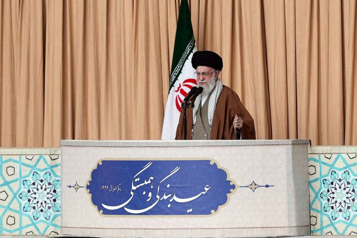 Iran Supreme Leader Gives Speech - Holding Army Rifle!