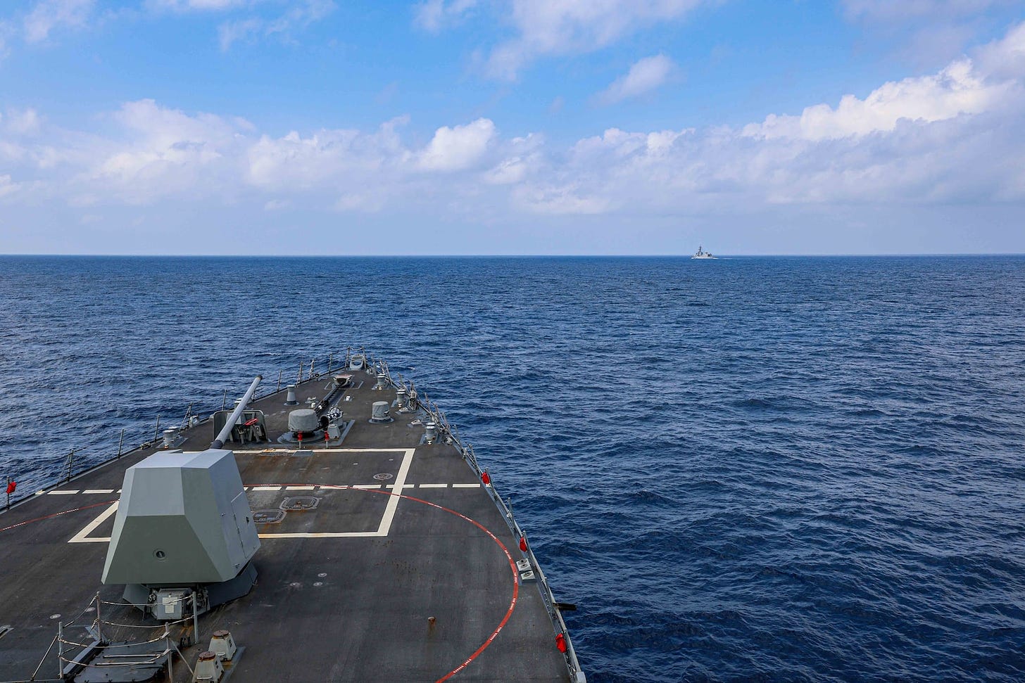 The Arleigh Burke-class guided-missile destroyer USS John Finn (DDG 113), sails with the Japan Maritime Self-Defense Force ship JS Sazanami (DD 113) and Royal Australian Navy ship HMAS Warramunga (FFH 152) during trilateral operations in the South China Sea, Feb. 7.