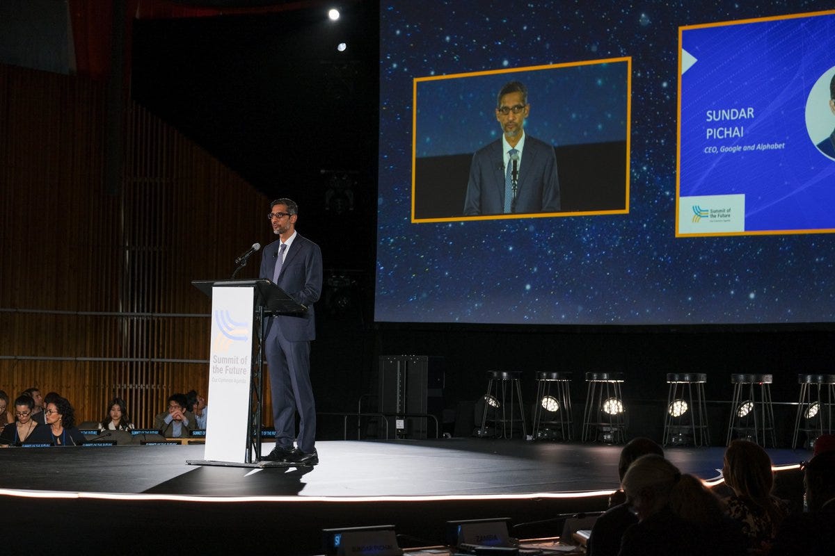 Google CEO Sundar Pichai delivering a keynote address on stage at the “Summit of the Future”