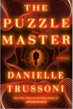 A red and black book with the words the puzzle master and Danielle Trussoni on it in red font. 