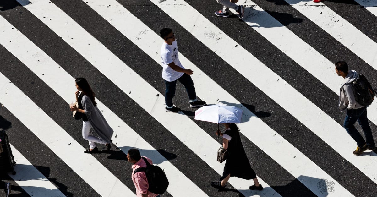 People on a pedestrian crosswalk