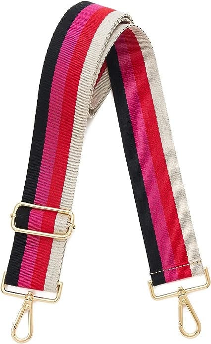 Purse strap with black, hot pink, red and off white strip and gold hardware