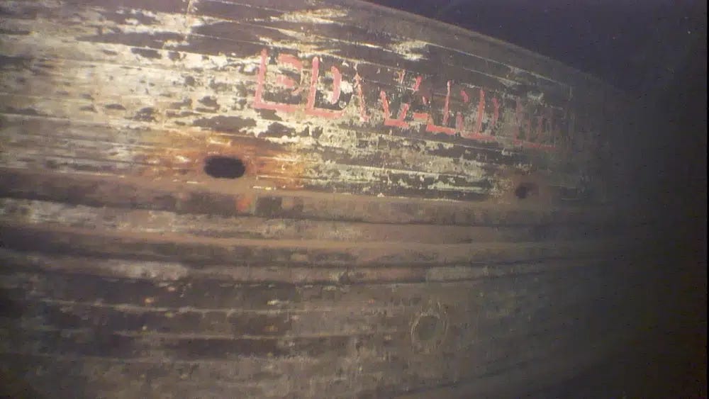 In this image taken from video provided by the Great Lakes Shipwreck Historical Society, lettering identifying the wrecked ship as property of the Edward Hines Lumber Company is seen in Lake Superior in August 2022. (Great Lakes Shipwreck Historical Society via AP)