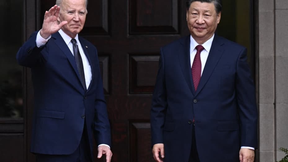US President Joe Biden greets Chinese President Xi Jinping before a meeting during the Asia-Pacific Economic Cooperation (APEC) Leaders' week in Woodside, California on November 15, 2023.