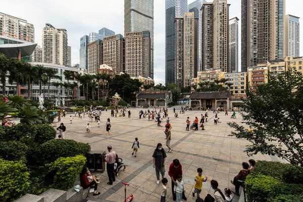 Children playing in the village square after school in Xiasha Village in Shenzhen, China, in November.